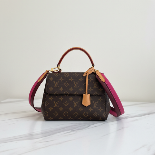 Louis Vuitton Cluny BB on white marble